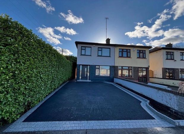 Freshly laid tarmac driveway at a semi-detached house